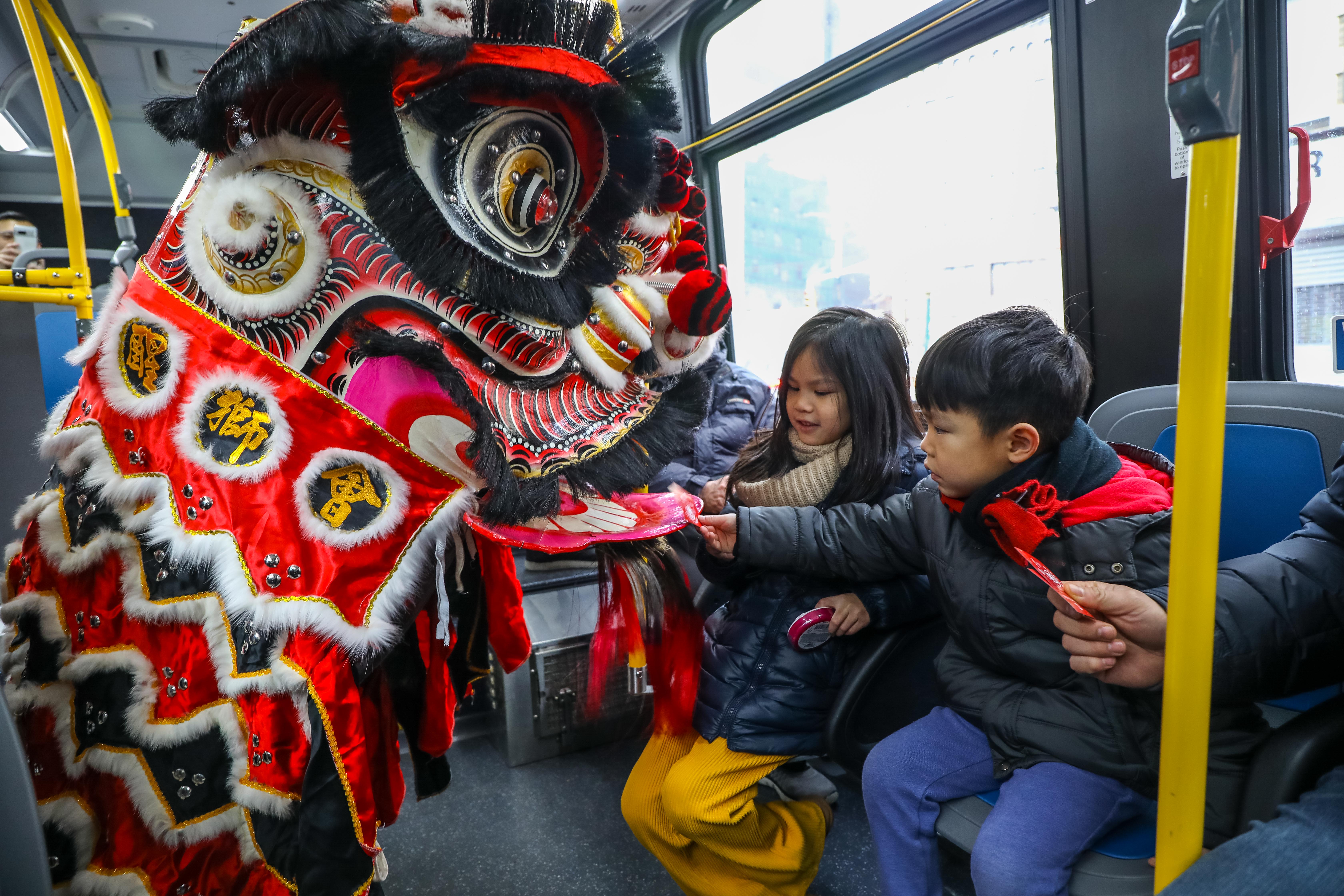 MTA celebrates Lunar New Year with dragon dancers and OMNY card giveaway