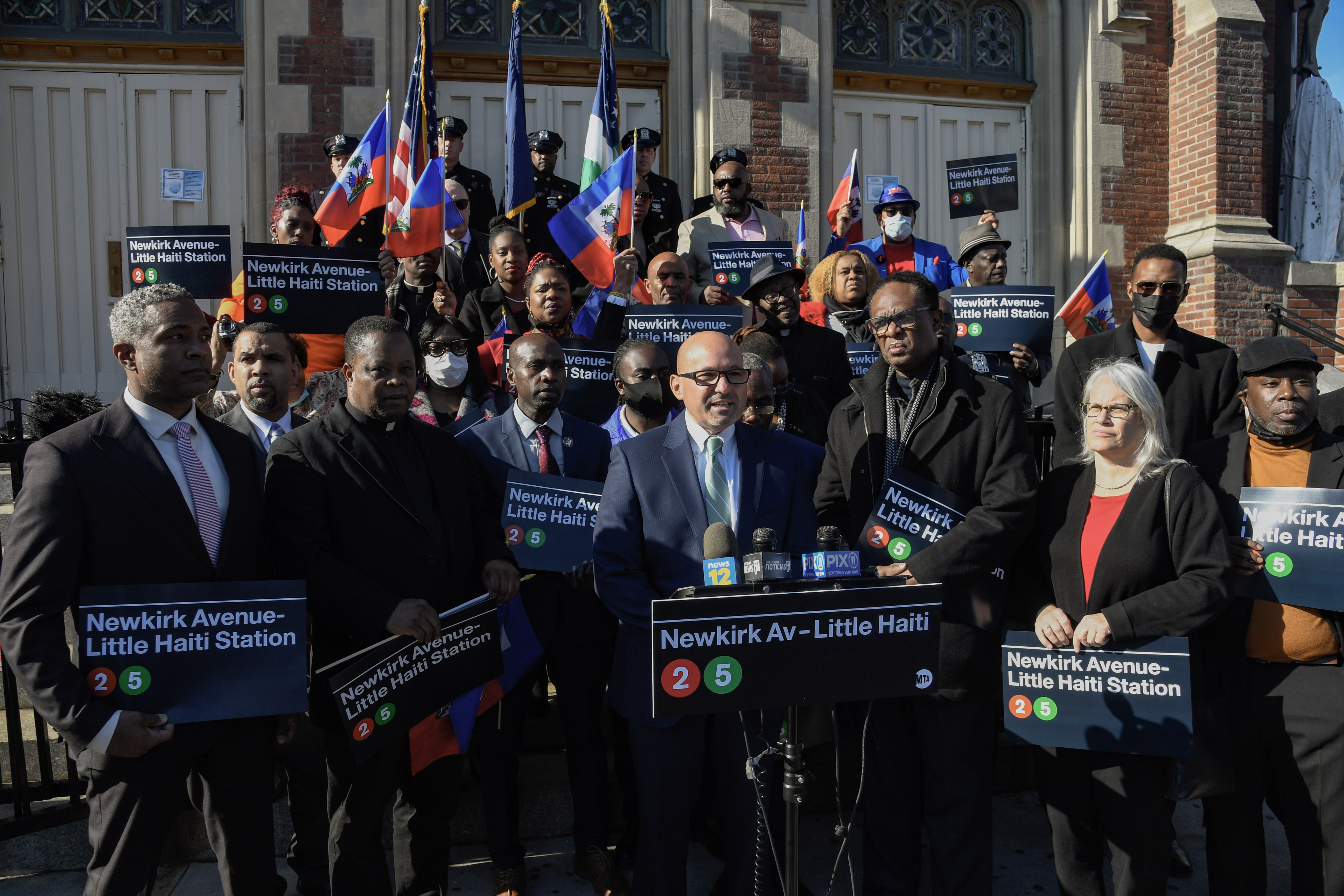 Interim MTA New York City Transit President Craig Cipriano and Senior Vice President of Subways Demetrius Crichlow join elected officials in a community celebration in front of St. Jerome Church to rename name the Newkirk Av station on the 2/5 lines as Newkirk Av-Little Haiti on Thu., November 18, 2021.