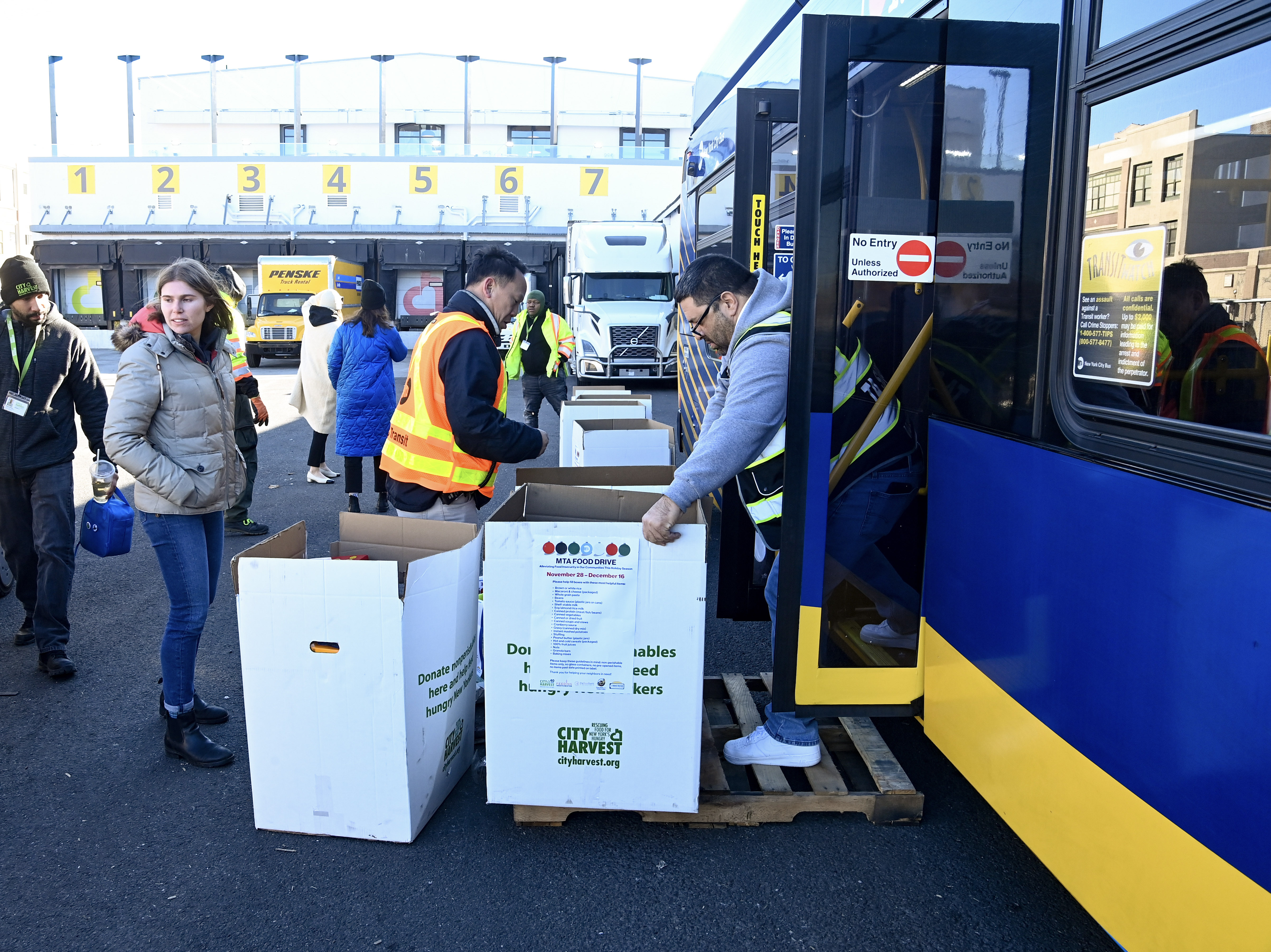 A bus makes a delivery to the City Harvest Cohen Community Food Resource Center in Brooklyn on Tuesday, Dec 20, 2022, the result of an MTA facility food drive.